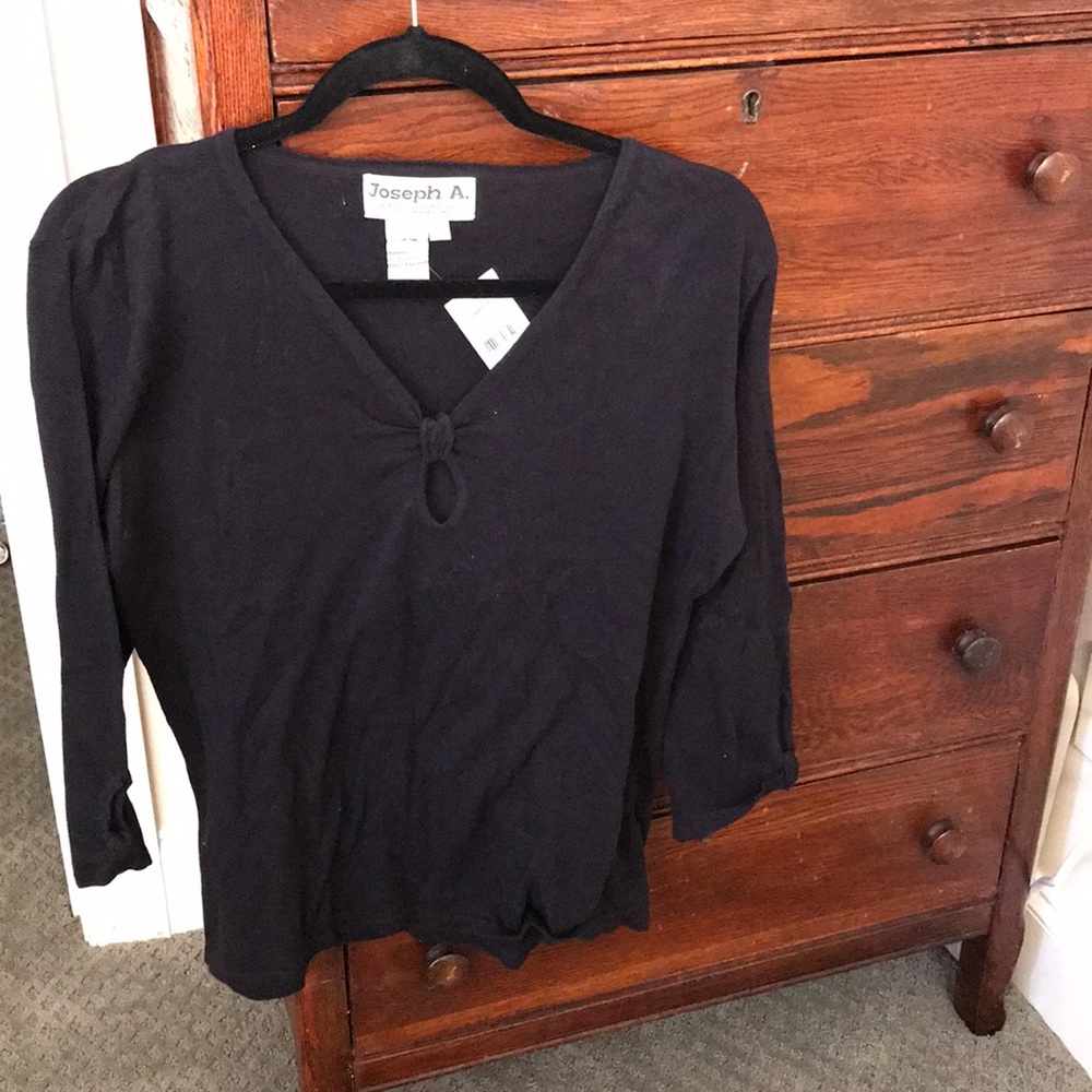 Black long sleeve with knot and opening in middle